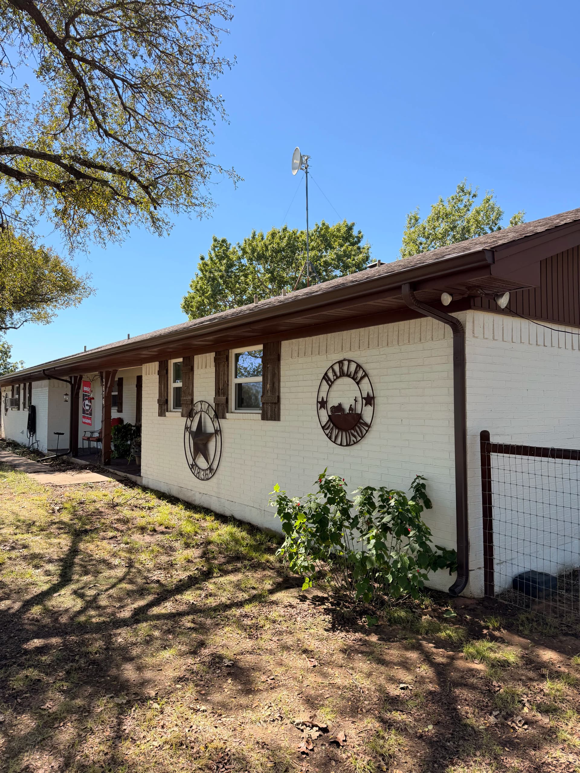 83 Feet of Royal Brown Gutter Keeps This Home's Landscaping Protected