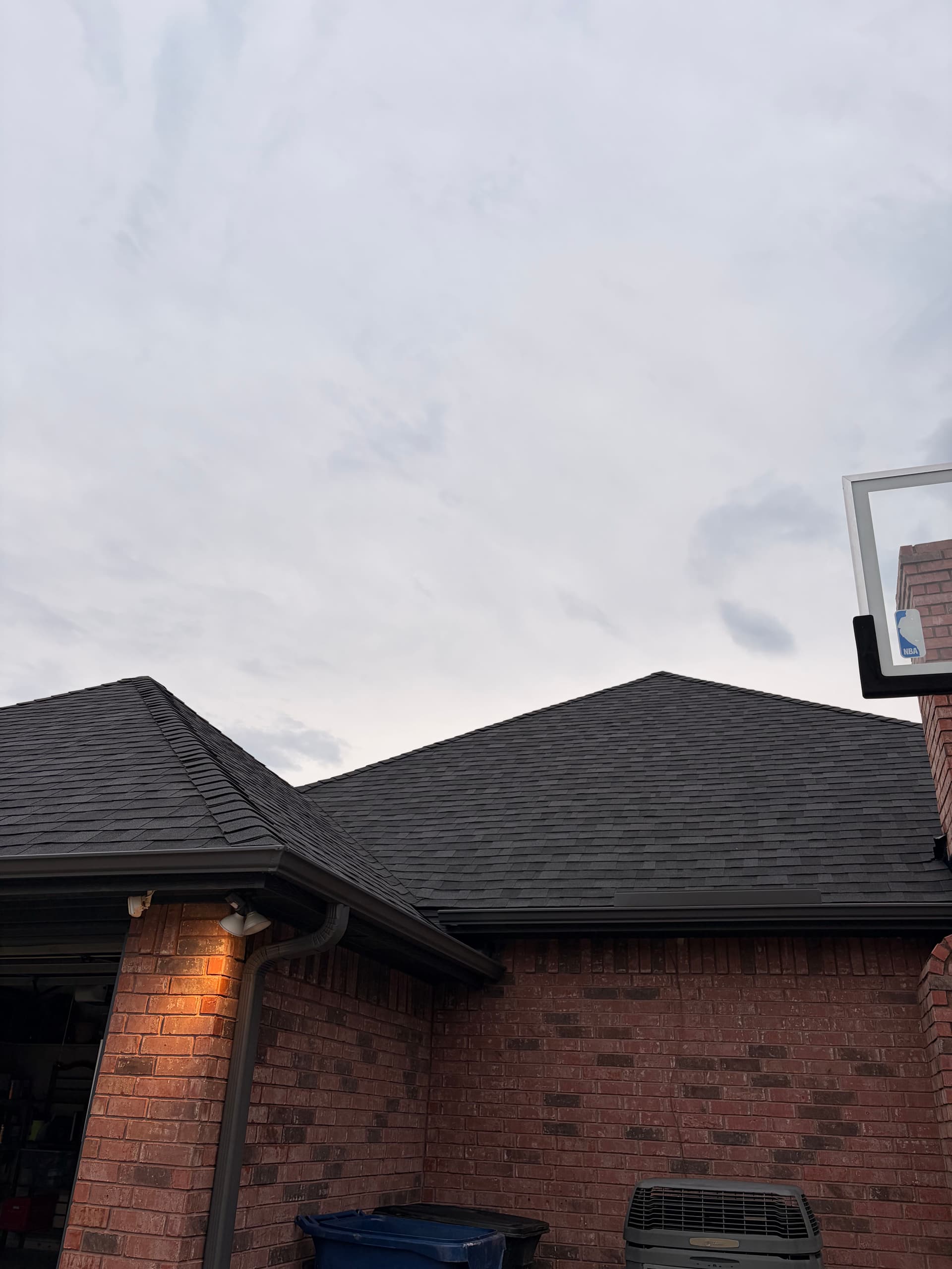 Gallery photos for Tuxedo Gray 5-Inch Seamless Gutters on a Brick Home: Image #7