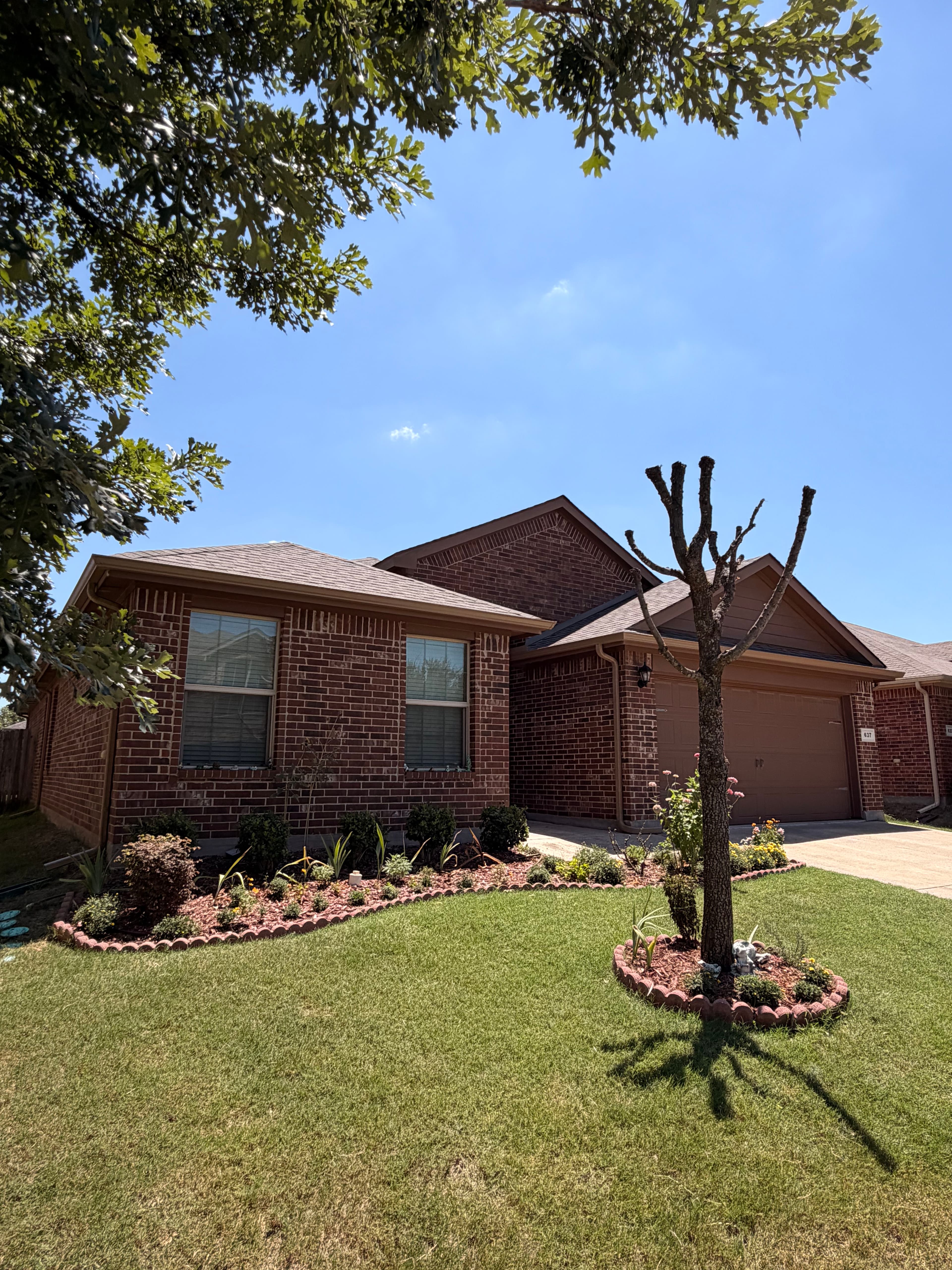 Project Seamless Gutter Installation on a Brick Home in Azle image
