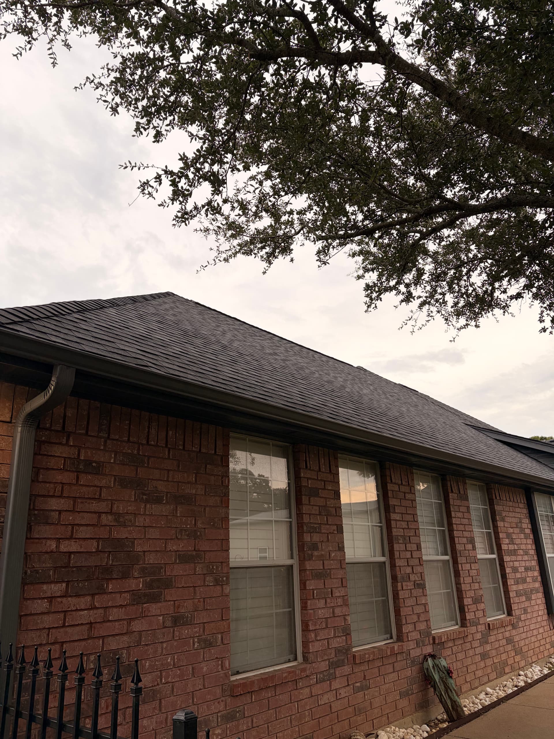 Gallery photos for Tuxedo Gray 5-Inch Seamless Gutters on a Brick Home: Image #5