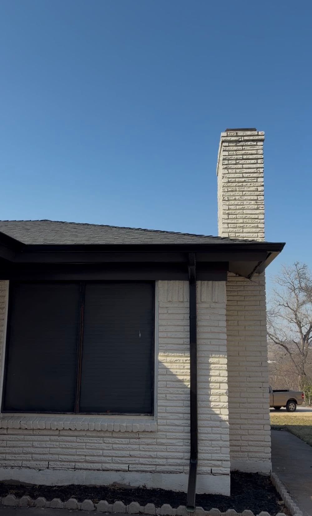Black Gutters and Leaf Guards Finish This Fort Worth Remodel