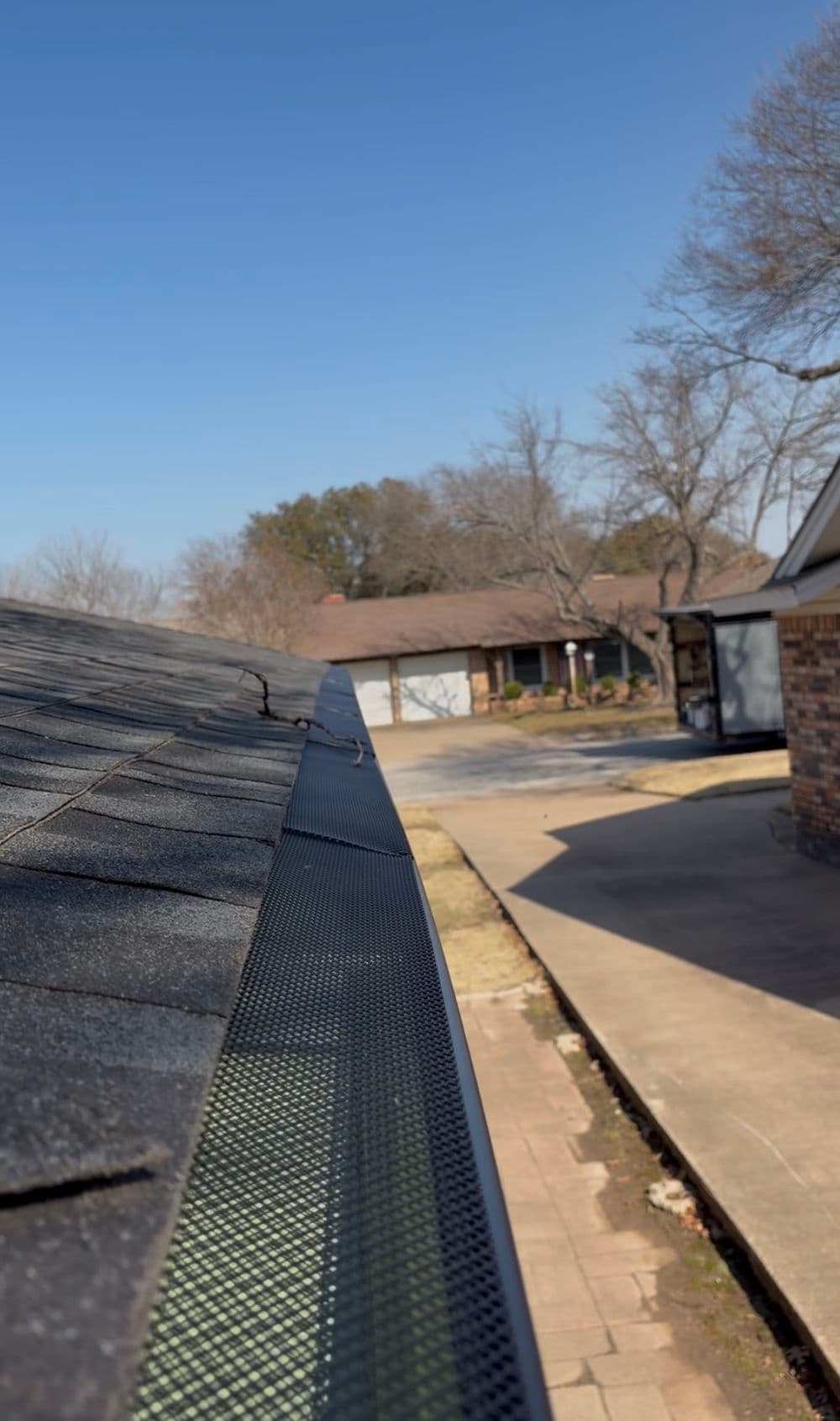 Black Gutters and Leaf Guards Finish This Fort Worth Remodel