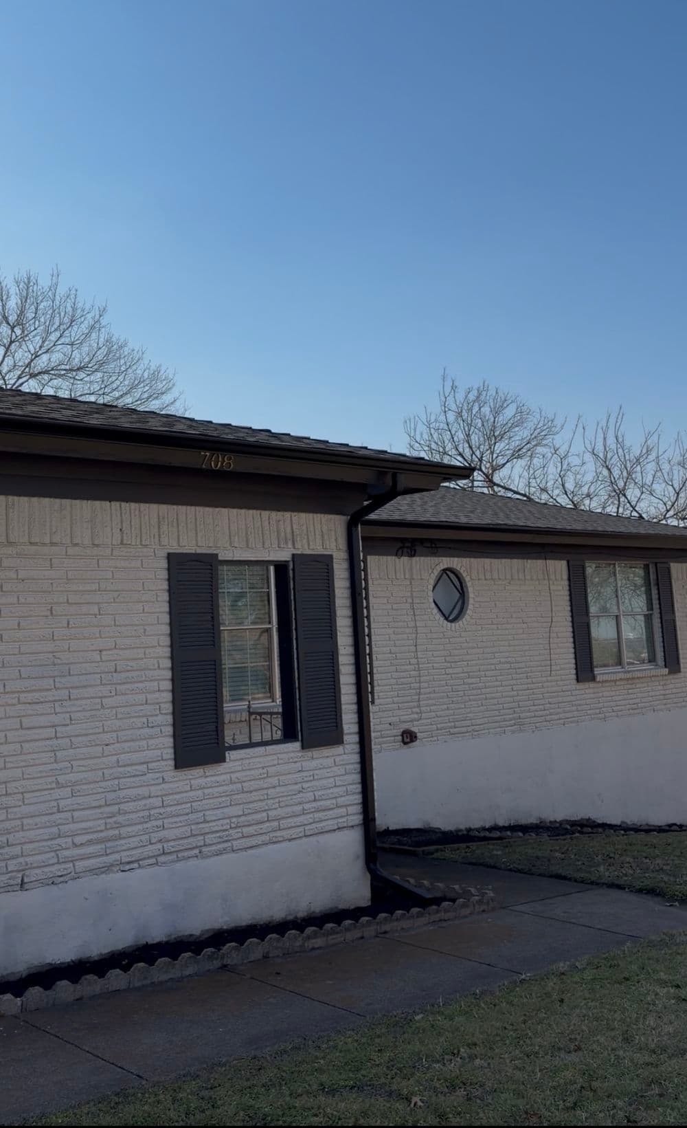 Black Gutters and Leaf Guards Finish This Fort Worth Remodel