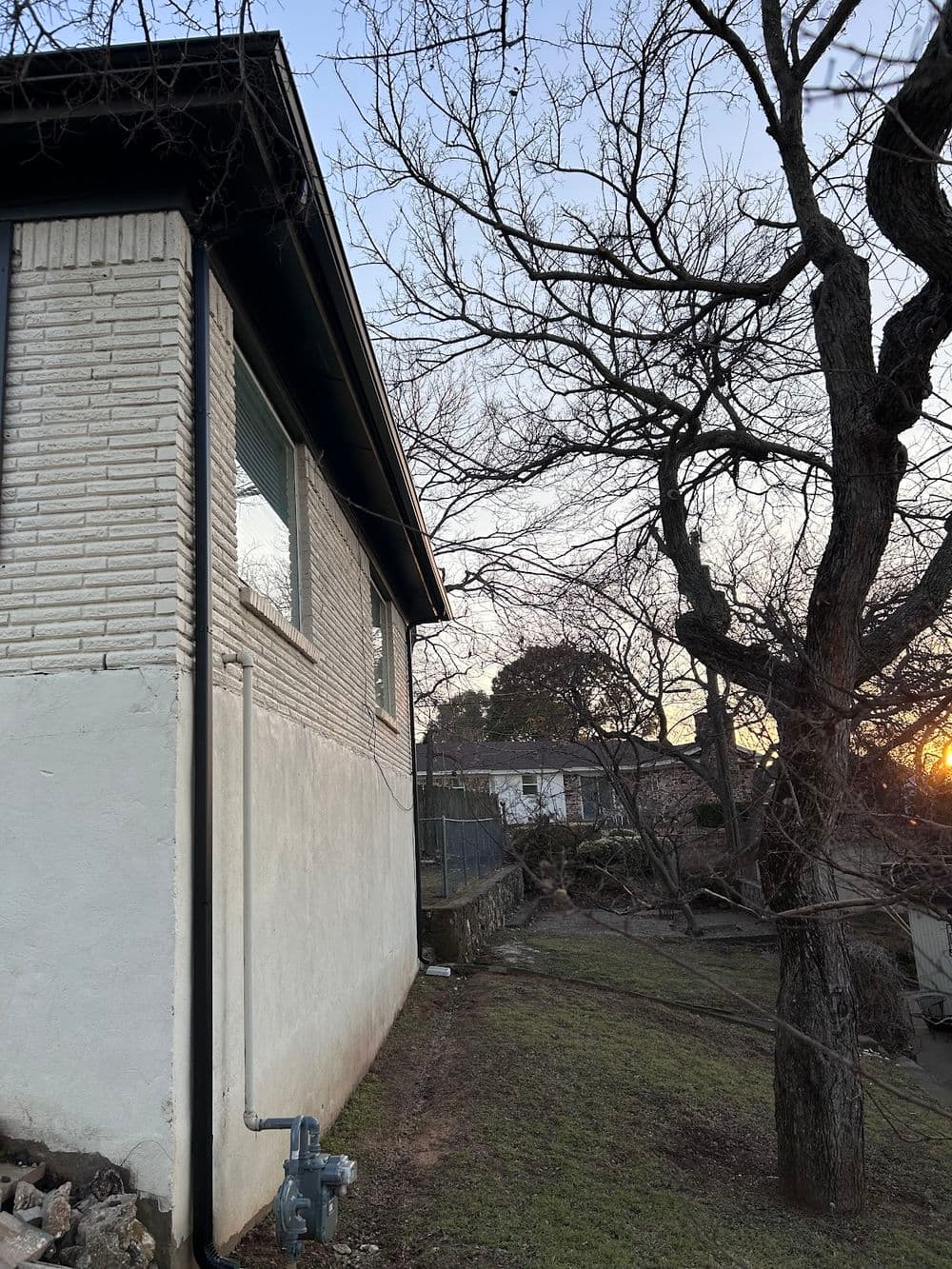 Black Gutters and Leaf Guards Finish This Fort Worth Remodel